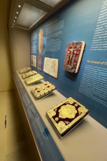 Showcase with historical handwritten books Gospels Church books of Arkadi Monastery in Museum