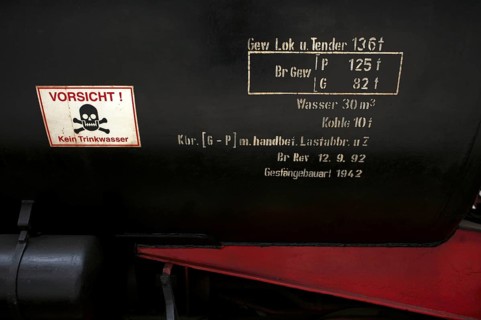 Markings on the tender of the class 52 steam locomotive of the Deutsche Reichsbahn DR with tub
