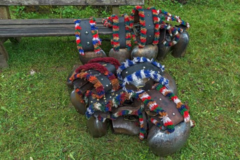 Cow jewellery bells, put together for the Almabtrieb, gabled house, Bad Hindelang, Allgaeu,
