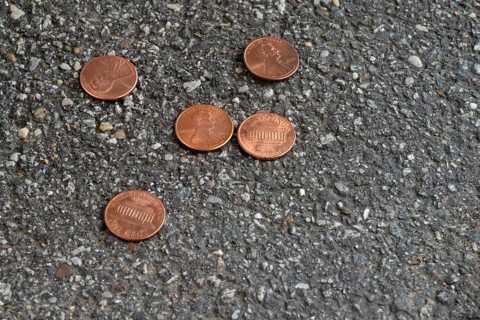 Money lying on the street, one cent, US currency