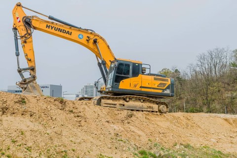Hyundai backhoe parked on hill at construction site in Daejeon, South Korea, Asia