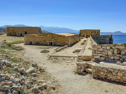 View of partly preserved old buildings on plateau of fortress, left rear former house of governor