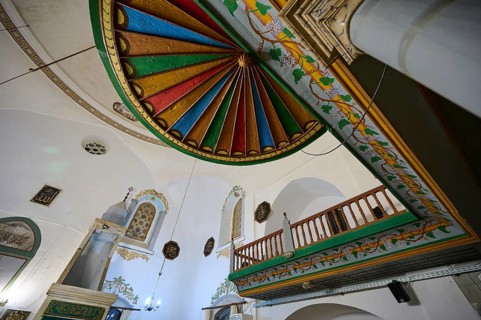 Retzep Pasha Mosque, Colourful painted ceiling of the interior of a mosque with decorative elements