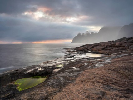 Devil's teeth in the fog at sunset, Devils Teeth, Okshornan Mountains, Tungeneset, Senja, Norway,