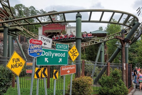 Road sign display for the Summer Celebrationin front of the FireChaser roller coaster ride in the