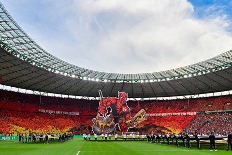 Red Devil with cup, choreo, choreography, fan action fan block, fans, fan curve, flags, flags,