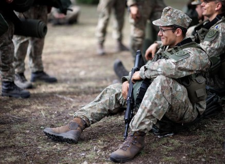 Young Lithuanian reserve soldiers take a lunch break during their training, taken in Rudninkai,