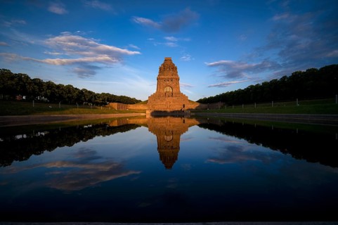 Monument to the Battle of the Nations, reflection in the lake, evening mood, Leipzig, Saxony,