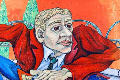 Realistic mural of a man in a red jacket against an orange background, Wall painting, East Side
