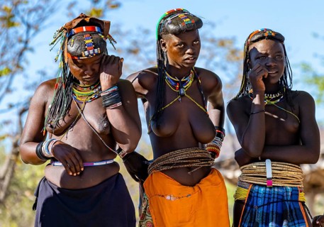 Hakaona woman with traditional kapapo hairstyle, Angolan tribe of the Hakaona, near Opuwo, Kunene,