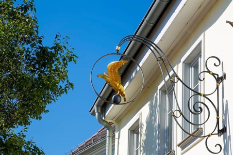 Inn sign, pub, restaurant, figure of a golden eagle, advertising sign, Hotel Adler am Schloss, nose