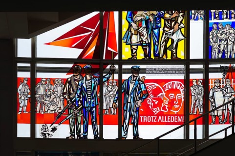 Interior photograph, stained glass window, Communist propaganda art, Rosa Luxemburg and Karl