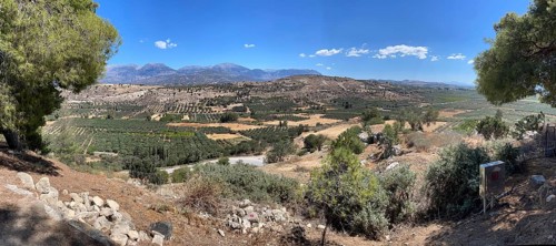 View from Phaistos palace hill to fertile Messara plain plain of Messara with many olive
