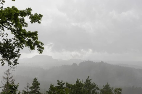 View from the goat's back in Saxon Switzerland during a thunderstorm, cloudburst, Hohnstein,
