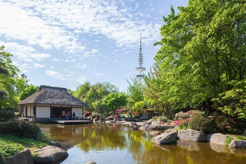 Teahouse in the Japanese Garden in the Planten un Blomen park with Hamburg television tower and