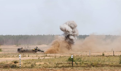 A Keiler armoured mine sweeper triggers an explosion, taken during the NATO large-scale manoeuvre