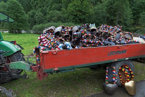 Jewellery cowbells for the cattle drive on a hanger, gabled house, Bad Hindelang, Allgaeu, Bavaria,