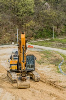 Hyundai backhoe parked at rural construction site in Daejeon, South Korea, Asia