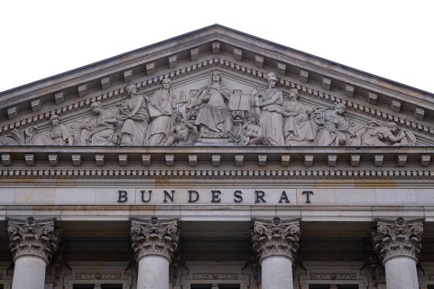 Lettering and relief in the tympanum above the main portal of the Bundesrat, Berlin, Germany,