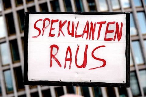 Sign with the inscription Speculators out. Demo under the motto The rent is too high. Around 150