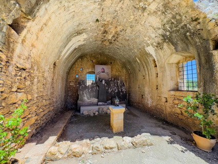 View of monument to sacrifice among monks residents of Arkadi Monastery in former wine cellar later