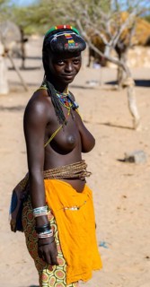 Hakaona woman with traditional kapapo hairstyle, portrait, Angolan tribe of the Hakaona, near