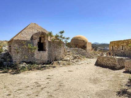 Left front former ammunition chamber centre back domed building of abandoned mosque on site of