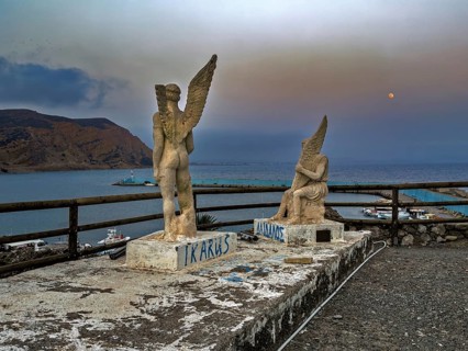 Photo taken at dusk evening mood of monument to Daedalus and Icarus on cliff of flight for flight