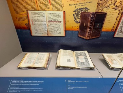 Showcase in museum Monastery museum with antique books partly from historical former copying
