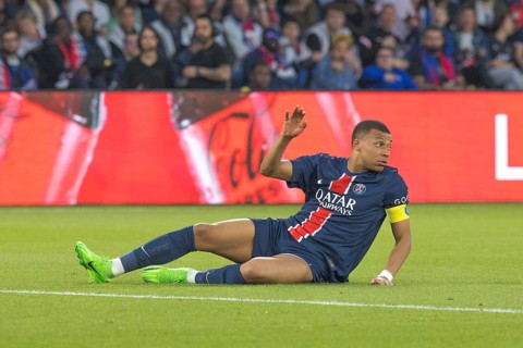 Football match, captain Kylian MBAPPE' Paris St Germain has just been fouled and is lying on the