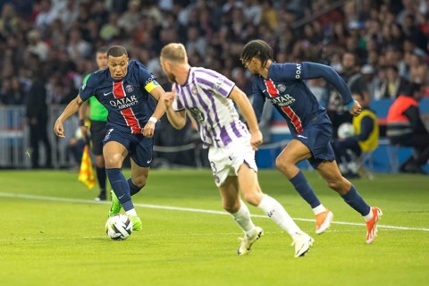 Football match, captain Kylian MBAPPE' Paris St. Germain left on the ball, a player of FC Toulouse