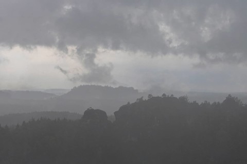 View from the goat's back in Saxon Switzerland during a thunderstorm, cloudburst, Hohnstein,