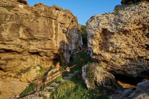 Rock chapel, Archangel Michael Panormitits, A stony footpath leads through a rocky landscape in