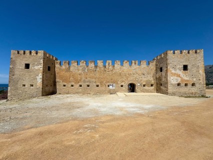 Exterior view with two corner towers walls battlements entrance of Fort Fortezza Fortetza