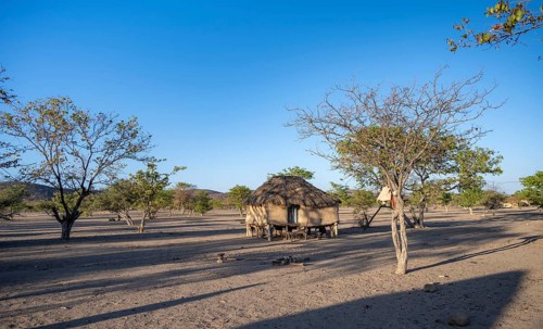 Mud house in a Hakaona village near Opuwo, Kunene, Namibia, Africa