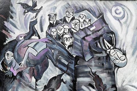 Graffiti on the Berlin Wall in the East Side Gallery, Berlin, Germany, Europe, Surreal graffiti art