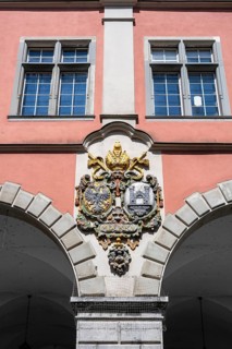 Coat of arms on the old theatre in the historic old town of Ravensburg, on the left the imperial