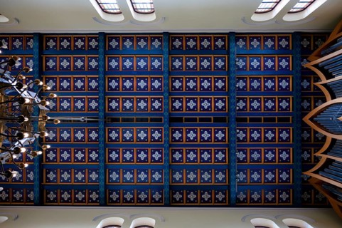 Interior view of wooden coffered ceiling with dark blue painted beams, St. Marien am Behnitz,