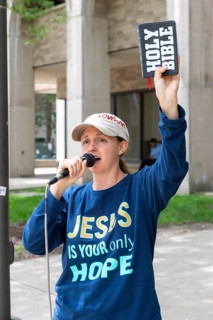 Detroit, Michigan, Reina LaCroix preaches for Jesus on the campus of Wayne State University. She is