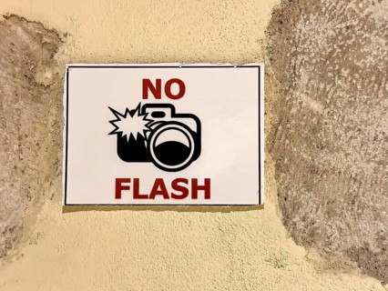 Prohibition sign Notice photography with flash prohibited tourist information in museum of UNESCO