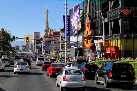 Las Vegas, Nevada, USA, North America, A busy street with lots of cars and people, an Eiffel Tower