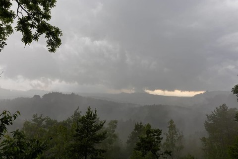 View from the goat's back in Saxon Switzerland during a thunderstorm, cloudburst, Hohnstein,