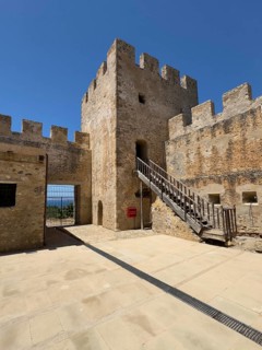 View from inner courtyard to corner tower with staircase entrance of Fort Fortezza Fortetza