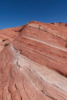 Layered rock formations along the Fire Wave Trail at Valley of Fire State Park near Overton,
