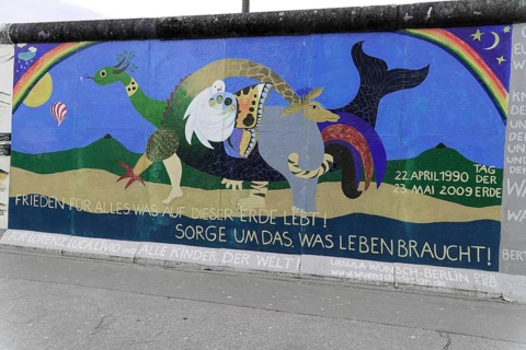 Graffiti on the Berlin Wall in the East Side Gallery, Berlin, Germany, Europe, Cheerful wall art