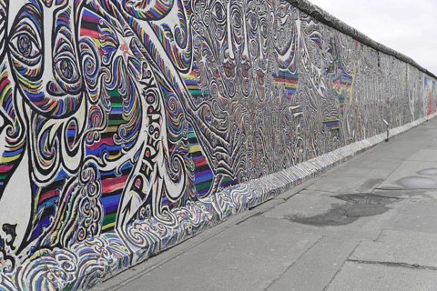 Graffiti on the Berlin Wall in the East Side Gallery, Berlin, Germany, Europe, Abstract, dynamic