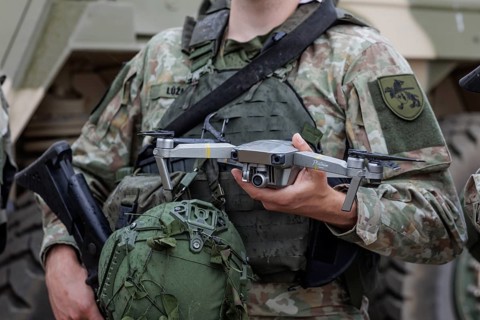 A Lithuanian army drone pilot holds a reconnaissance drone, taken during the NATO Steadfast