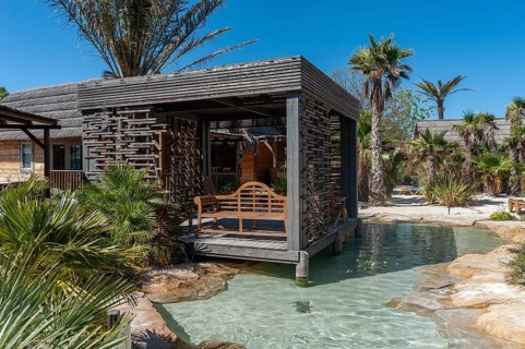 Modern wooden architecture in the holiday home development on the Plage de Port Grimaud beach, Port
