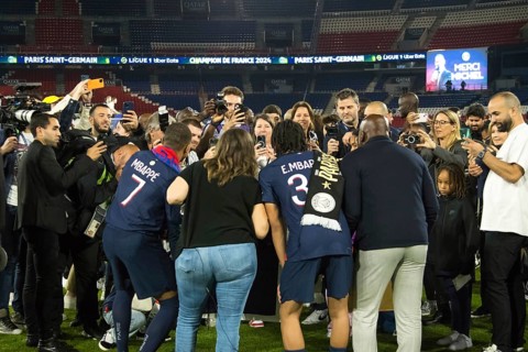 Football match, MBAPPE' family seen from behind from left to right: Captain Kylian MBAPPE' Paris St