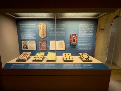 Showcase in museum Monastery museum with antique books partly from historical former copying